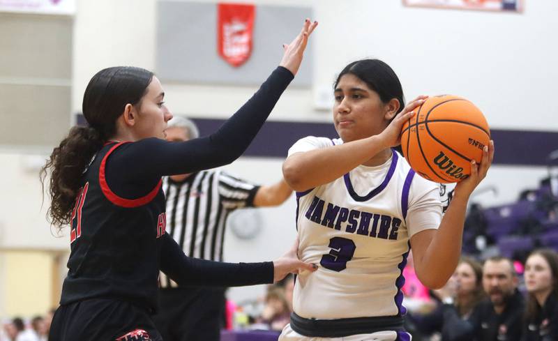 Huntley’s Luca Garlin, left, guards Hampshire’s Jiselle Lopez in varsity girls basketball on Wednesday, Feb. 11, 2026, at Hampshire High School in Hampshire.