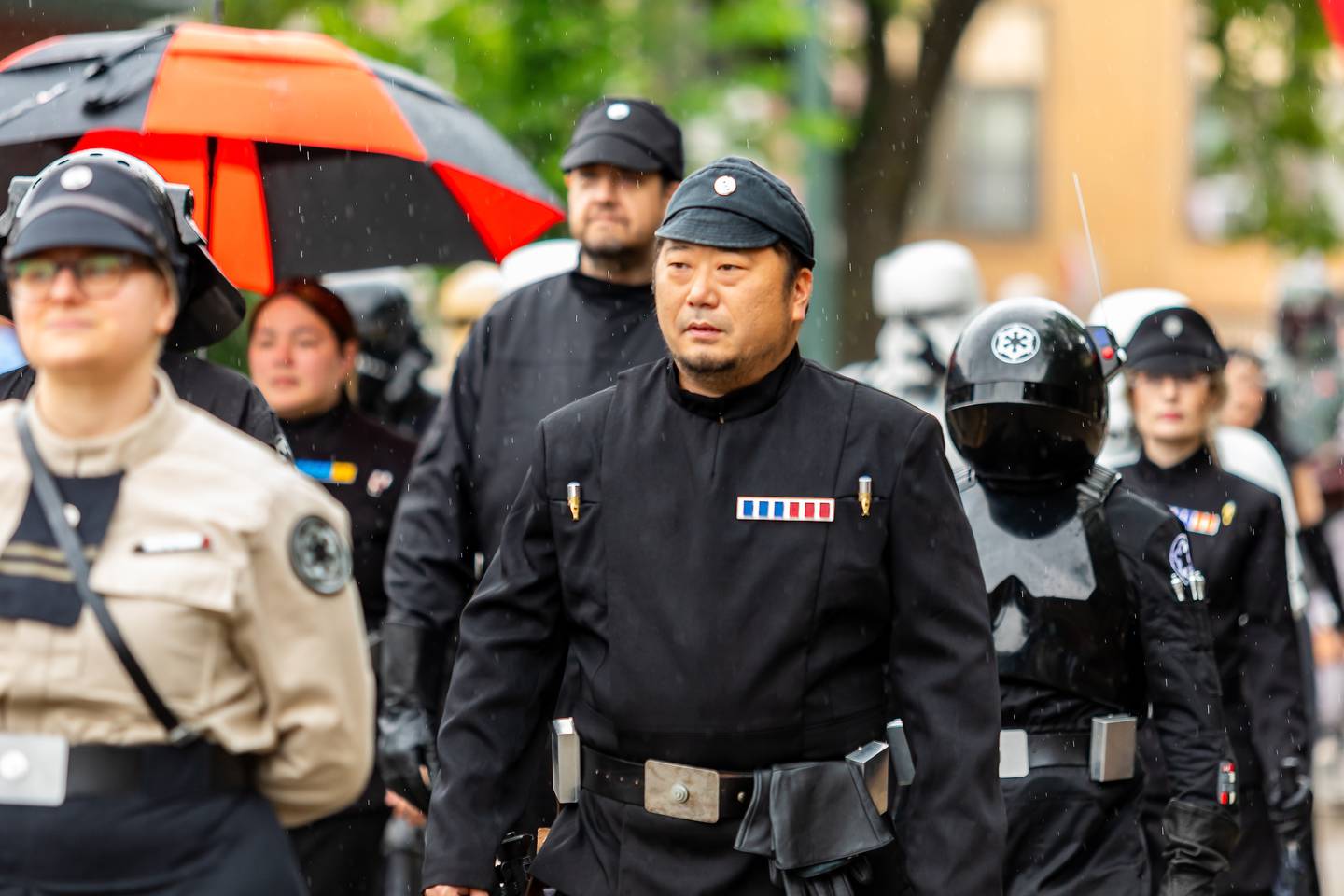 Sam Meadows, of Plainfield, walks as an Imperial Officer, along with the Midwest Garrison Chapter of the 501st Legion during Joliet Public Library's Star Wars Day Parade on June 1, 2024.