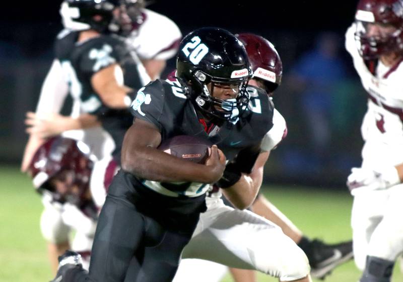 Woodstock North’s David Randecker runs the ball in varsity football at Rod Poppe Field on the campus of Marengo High School in Marengo on Friday, Sept. 12, 2025.