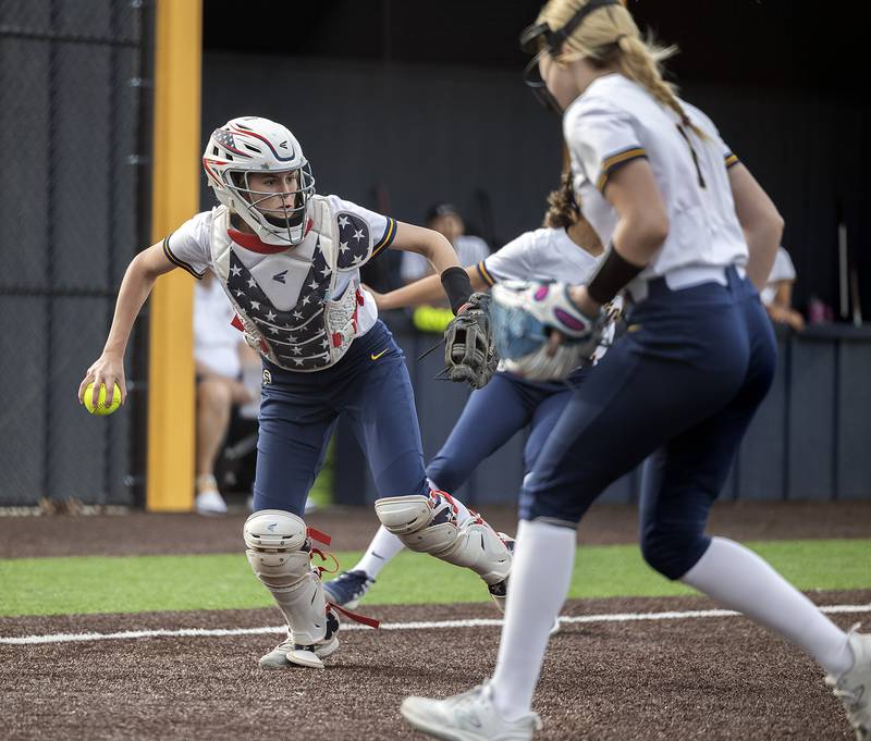 Sterling’s Marley Sechrest makes a play on a bunt against Rockridge Wednesday, April 10, 2024 at Sterling High School.
