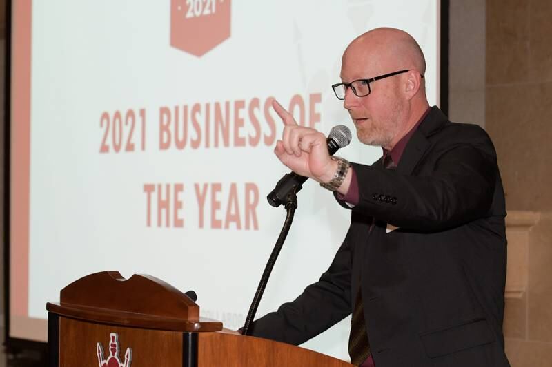 Shawn Lowe accepts the 2021 Business of the Year ward on behalf of 94.9 WDKB radio during the DeKalb’s Annual Celebration Dinner at the Barsema Alumni & Visitors Center on Thursday, Feb. 3, 2022.