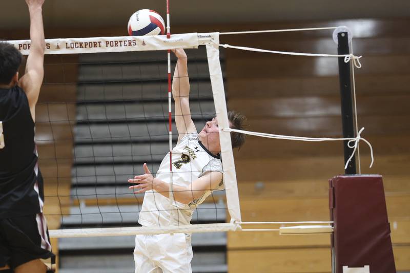Joliet West’sTyler Bishop stretches for a snot against Lockport on Tuesday, March 31, 2026 in Joliet.
