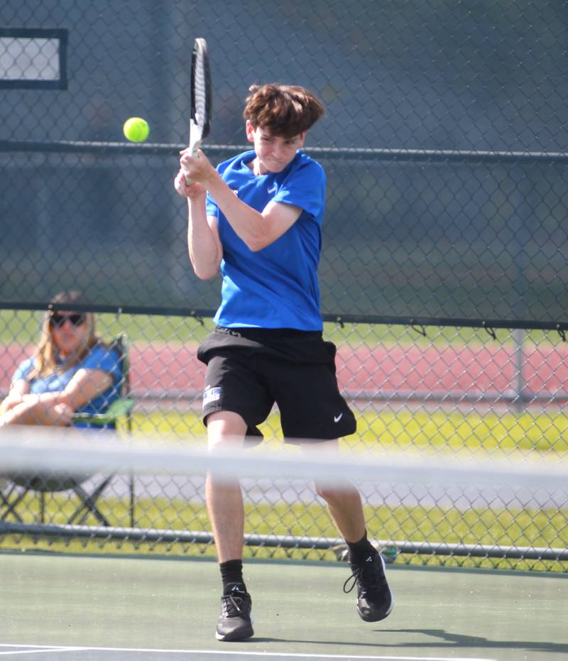Lincoln-Way East’s Sam Cooley returns the ball during a doubles match with partner Tanner Leonard (not pictured) in the state championship preliminaries at Buffalo Grove High School on Thursday, May 23, 2024.