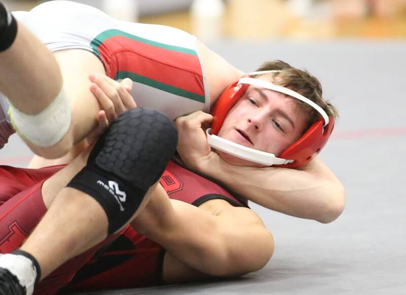 Streator's Garritt Benstine gets pinned by L-P's Reegan Kellett during a meet on Wednesday, Dec. 13, 2023 in Sellett Gymnasium at L-P High School.