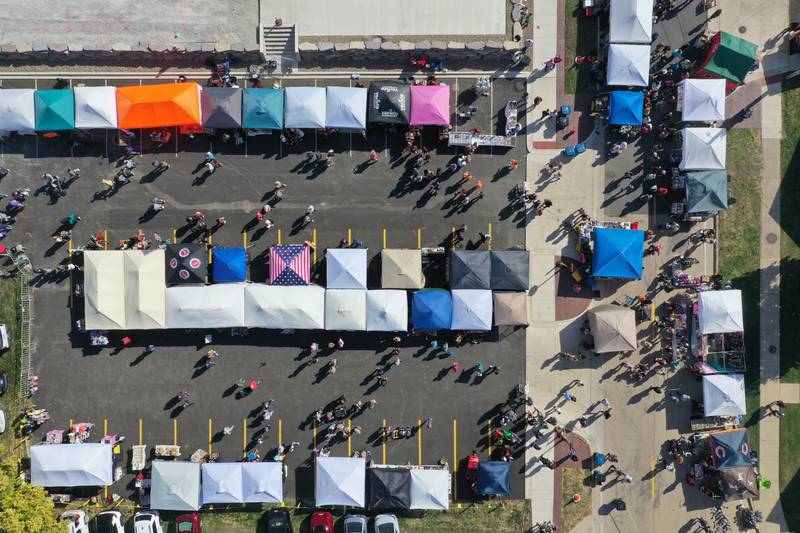 An aerial view of vendors and crowd during the 54th annual Burgoo festival on Sunday, Oct. 13, 2024 downtown Utica.
