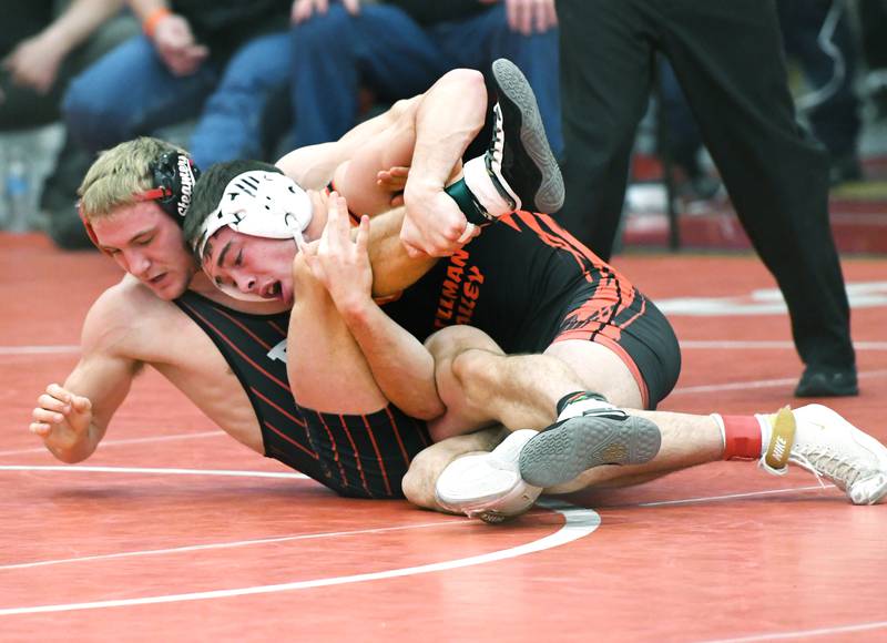 Fulton's Ben Fosdick (left) wrestles Stillman Valley's Aiden Livingston at 145-pounds at the 1A Oregon Wrestling Sectional on Friday night.