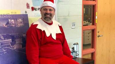 D-54 principal dresses up as elf to brighten students' holidays