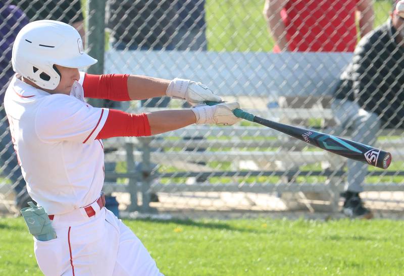 Ottawa's Rory Moore makes contact with the ball on Monday, April 20, 2026 at Ottawa High School.