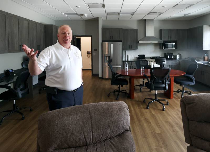 DeKalb Fire Chief Mike Thomas talks about the lounge area and kitchen Tuesday, April 29, 2025, at the newly opened DeKalb Fire Station No. 4 on South Malta Road near the Schnucks shopping center.