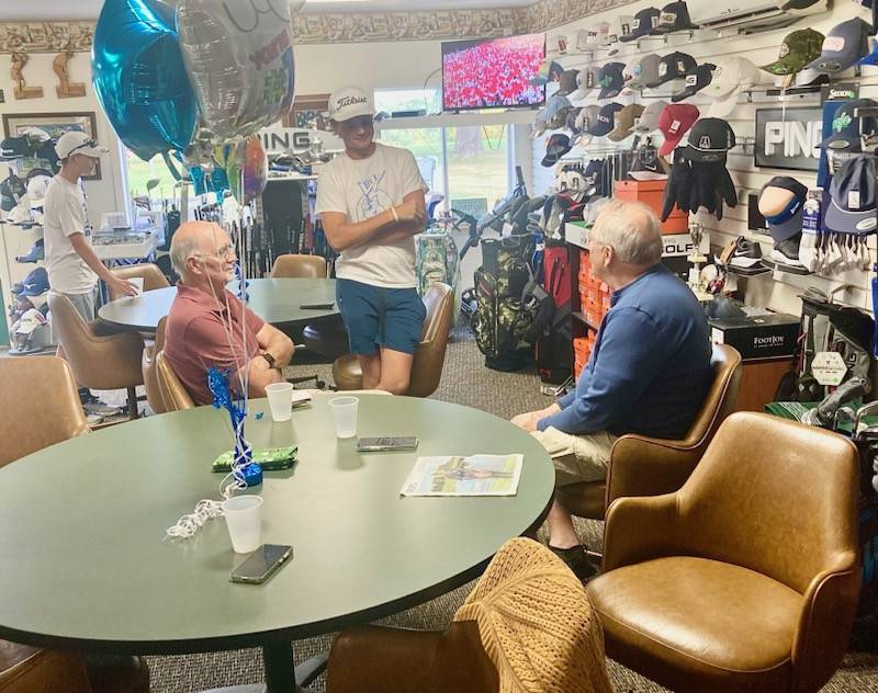 Bureau Valley's Wyatt Novotny visits with guests at his open house at Wyaton Hills Golf Course on Saturday. He won the IHSA Class 1A State championship last week.