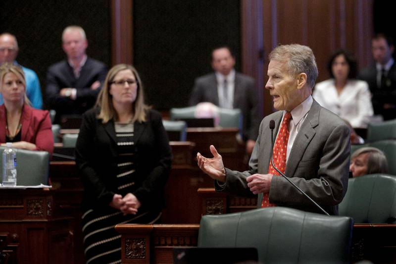 Illinois Speaker of the House Michael Madigan, D-Chicago, speaks to lawmakers while on the House floor during session at the Illinois State Capitol Tuesday, July 28, 2015, in Springfield, Ill. Madigan filed legislation that would block a controversial pay raise for lawmakers. (AP Photo/Seth Perlman)