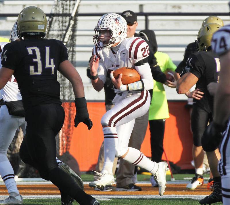 Prairie Ridge's Sampson Evans runs down the sideline for a first down in the second quarter against Sacred Heart-Griffin in the Class 6A State Football final Saturday, Nov. 26, 2016.