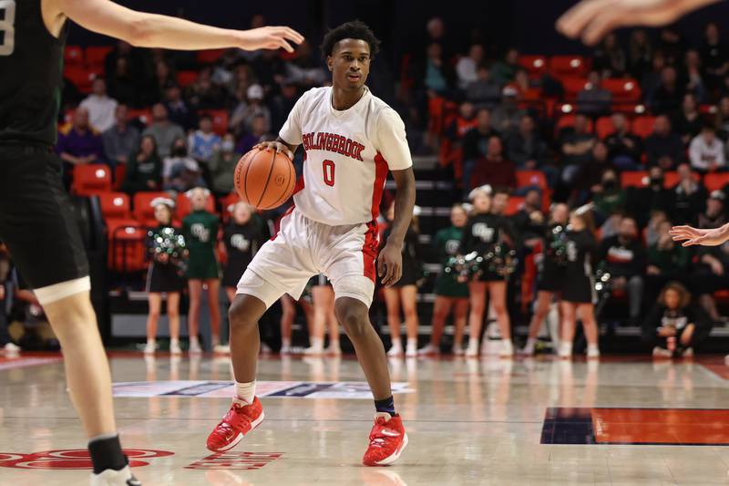 Bolingbrook’s Mekhi Cooper looks to pass against Glenbard West in the Class 4A semifinal at State Farm Center in Champaign. Friday, Mar. 11, 2022, in Champaign.