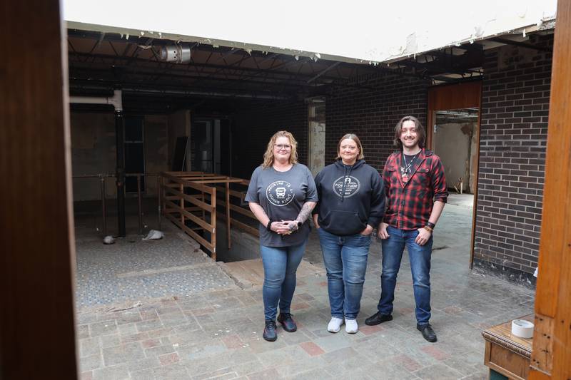 Dawn Broers, executive director of Fortitude Community Outreach, center, stands with staffers Sarah Tuttle, left, and Ben Broers, inside the shelter's new location in East Kankakee. For its achievements this past year, Fortitude has received the 2025 Progress Award for Innovator in Social Services.