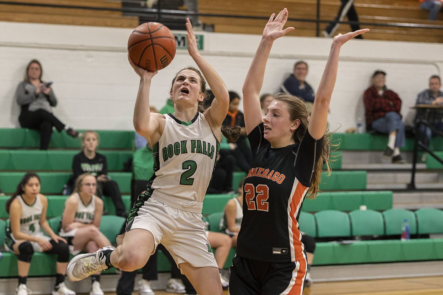 Rock Falls’ Brooke Howard is fouled putting up a shot against Winnebago Friday, Jan. 20, 2023.