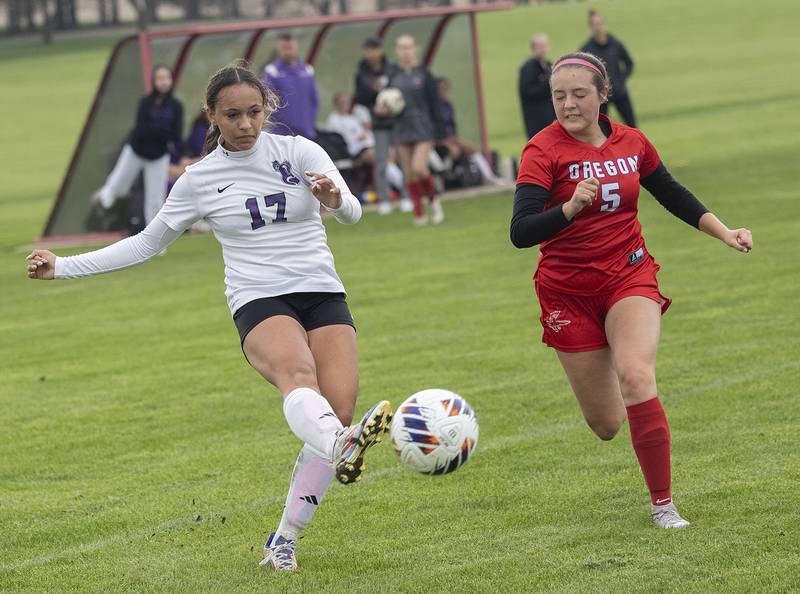 Dixon’s Kamille Prather kicks the ball against Oregon’s Ava Carenno Thursday, May 1, 2025.