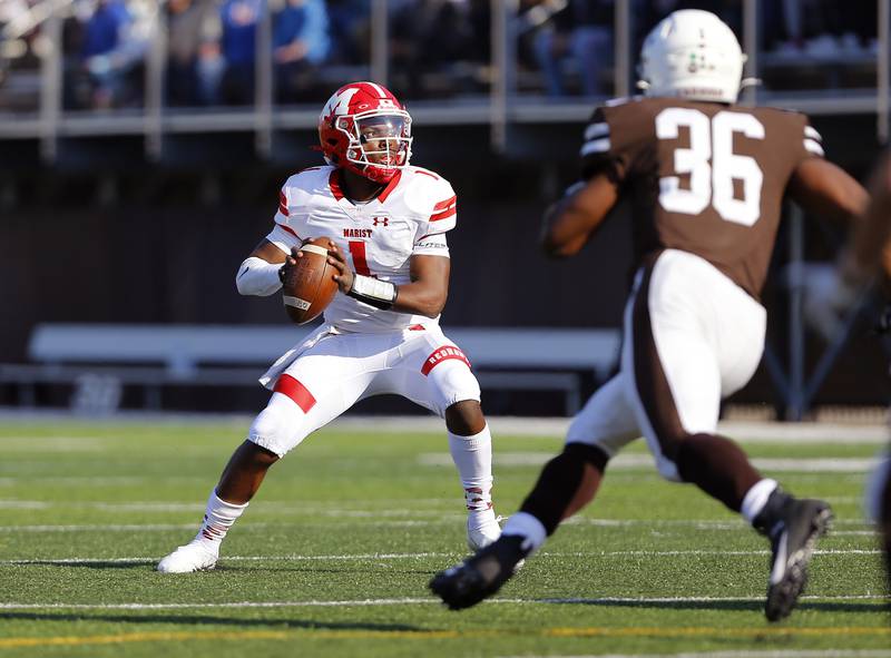 Marist's Dontrell Jackson Jr. drops back to pass as the Marist RedHawk faced the Mount Carmel Caravan on Saturday, April 3, 2021 on Carey Field at Barda-Dowling Stadium in Chicago, IL. Mt. Carmel won 24-21.