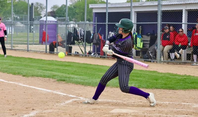 Rochelle's Chloe Escatel hits a pitch during a game with Forreston. Escatel was 3 for 3 with a double, three runs scored and an RBI in the win.