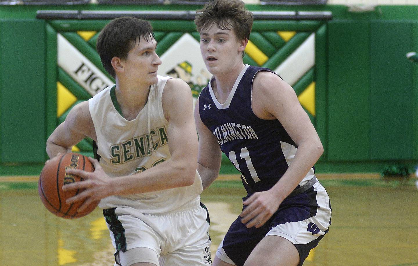 Seneca’s Calvin Maierhofer looks to pass around Wilmington’s Cade McCubbin in the 4th period on Saturday, Feb. 4, 2023 at Seneca.