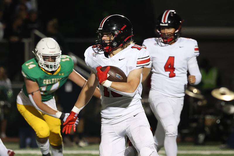 Lincoln-Way Central’s Tyler Tulk rushes against Providence on Friday, Sept. 6, 2024 in New Lenox.