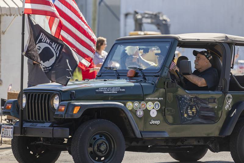 Veterans groups lead and trail the Vietnam Traveling Memorial Wall Thursday, August 31, 2023 as it comes into Rock Falls. The wall is being set up at RB&W Park and will remain there until Sunday.