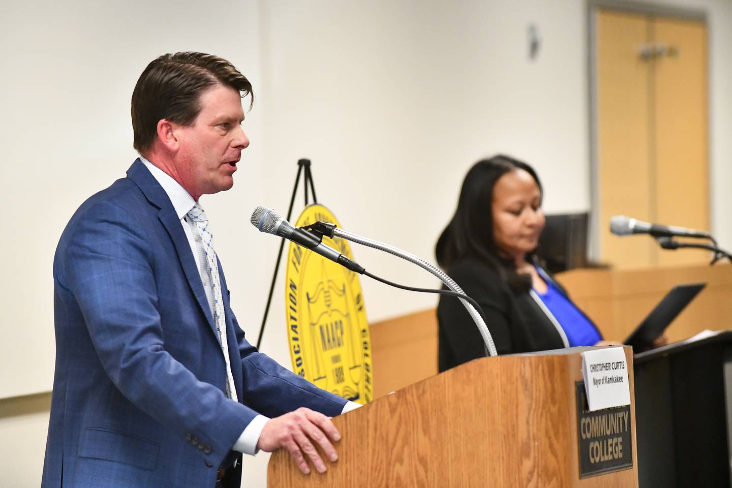 Kankakee Mayor Chris Curtis responds to a question during the Kankakee County NAACP Candidates Forum with Democratic mayoral candidate Genevra Walters on Tuesday, March 11, 2025, at Kankakee Community College.