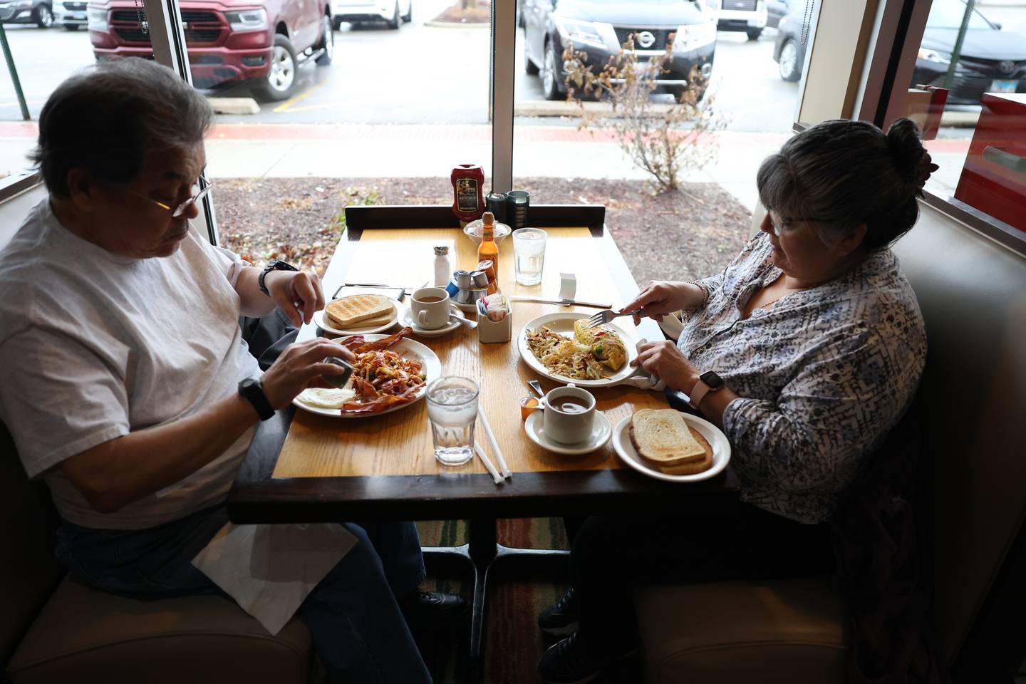 Robert and Juanita Vasquez, of Romeoville, enjoy breakfast at Tasty Waffle in Romeoville.