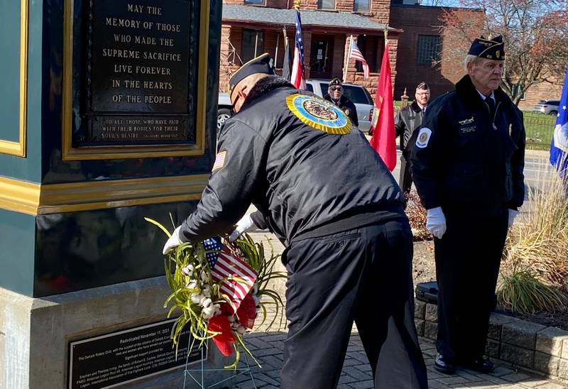 DeKalb American Legion Post No. 66 Cmdr Manual Olada, a U.S. Marines veteran, laid a ceremonial wreath at the Soldiers' and Sailors' Memorial Clock during an annual Veterans Day ceremony Saturday, Nov. 11, 2023 in downtown DeKalb. The event was hosted by the DeKalb American Legion Post No. 66.
