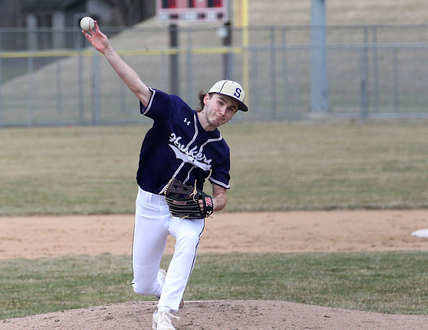 Serena's Cam Figgins delivers a pitch to Ottawa on Tuesday, March 21, 2023 at Ottawa High School.