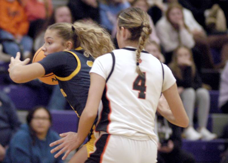 Jaelynn James  dishes the ball off. The Sterling Golden Warriors played  the Byron Tigers in the championship game of the Dixon Holiday Tournament at Dixon High School on Monday, December 29th, 2025.