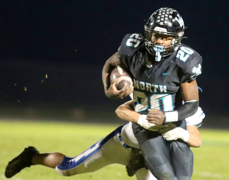Woodstock North’s David Randecker runs the ball against Woodstock in varsity football at Woodstock North High School on Friday, October 24, 2025.