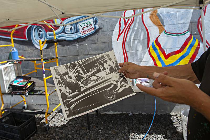 The now defunct Mural Society gave artist Robert Valdez reference materials in 1999. There were also requests for what the mural should represent, highlighting aspects of Hispanic culture in Sterling.