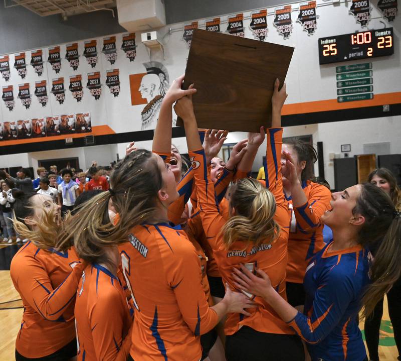 Genoa Kingston celebrates their 2A sectional win over Rock Falls in two sets, 25-11, 25-23. The Cogs will play Quincy Notre Dame on Friday in Princeton.