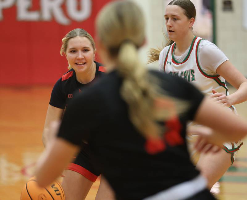 L-P's Charlie Pellegrini dribbles around L-P'w Drew Depenbrock on Monday, Jan. 12, 2026 in Sellett Gymnasium at L-P High School.