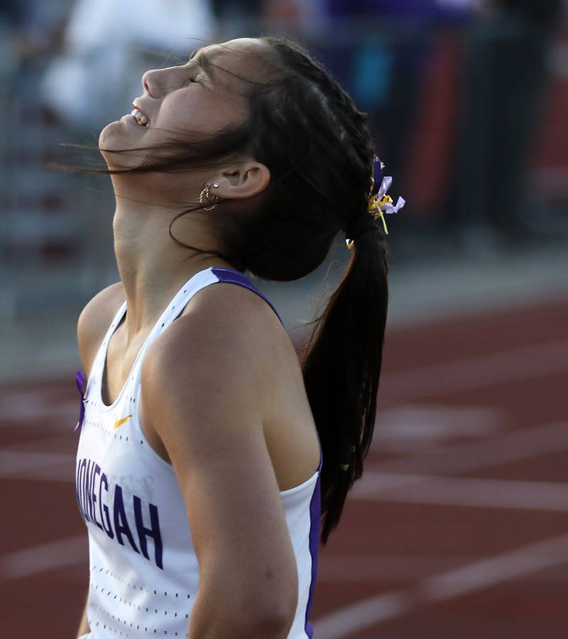 Hononegah’s Kylie Simpson reacts to finish fourth in the 800 meter run during the Huntley IHSA Class 3A Girls Sectional Track and Field Meet on Wednesday, May 8, 2024, at Huntley High School.