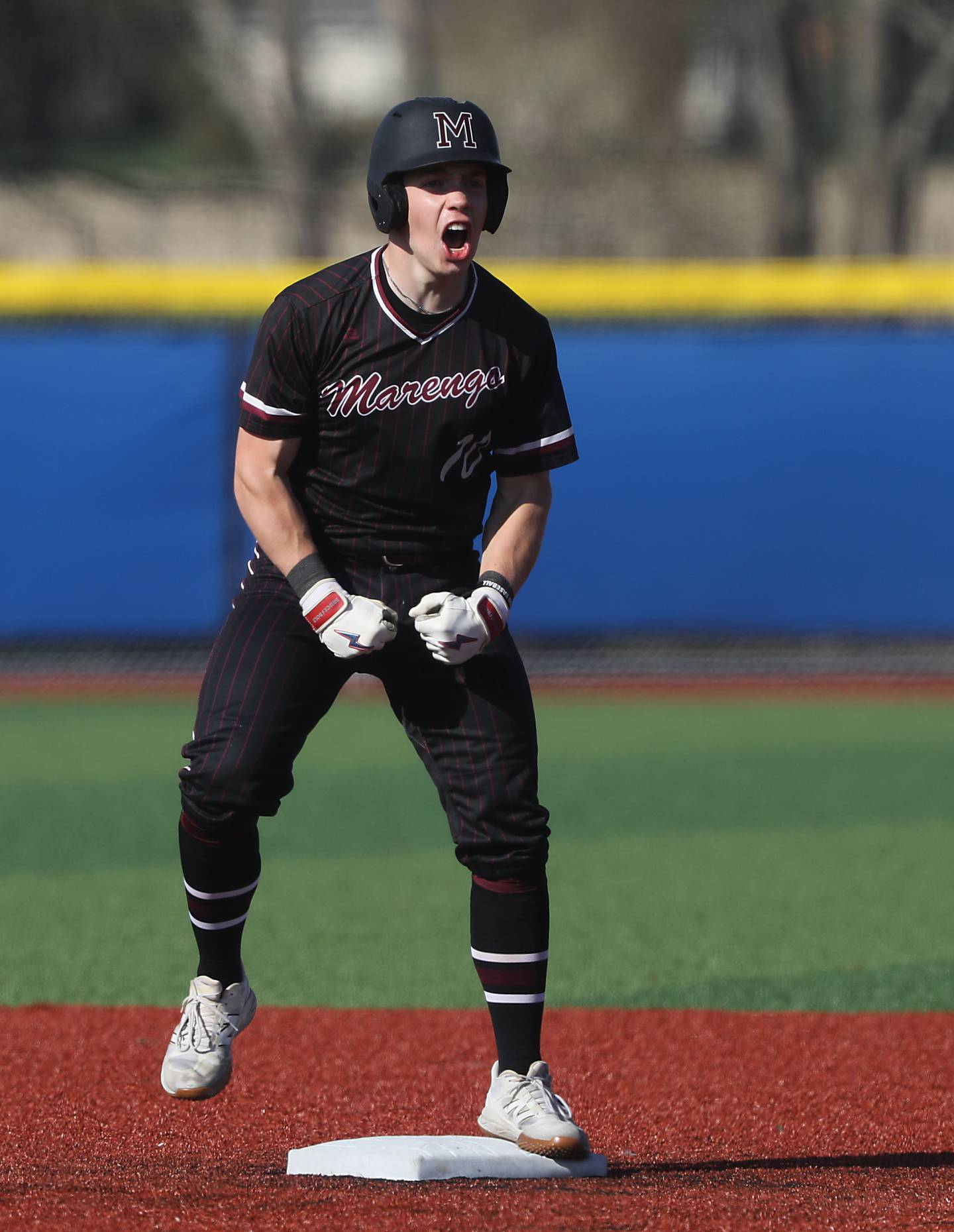 Marengo's Caden Oine celebrates a double during a Kishwaukee River Conference baseball game against Johnsburg on Wednesday, April 22,2026, at Johnsburg High School.