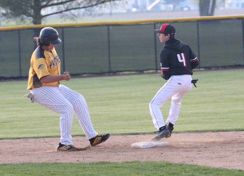 Putnam County's Josh Jessen cant get back to the bag to tag up as Henry-Senachwine's Teagan Williams on Tuesday, April 25, 2023 at Putnam County High School.