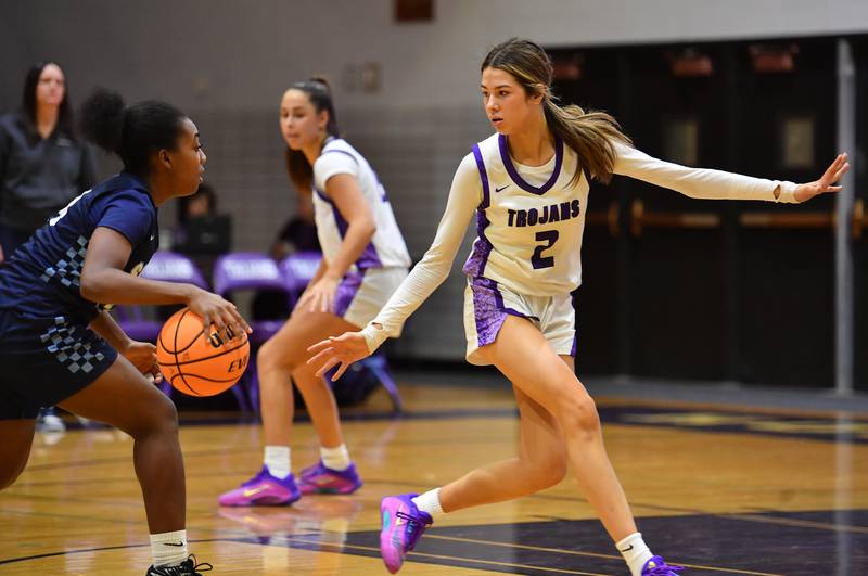 Downers Grove North’s Eva Yerkovich (2) defends against Downers Grove South’s Ionna Griffin during a game on December 20, 2025 at Downers Grove North High School in Downers Grove.