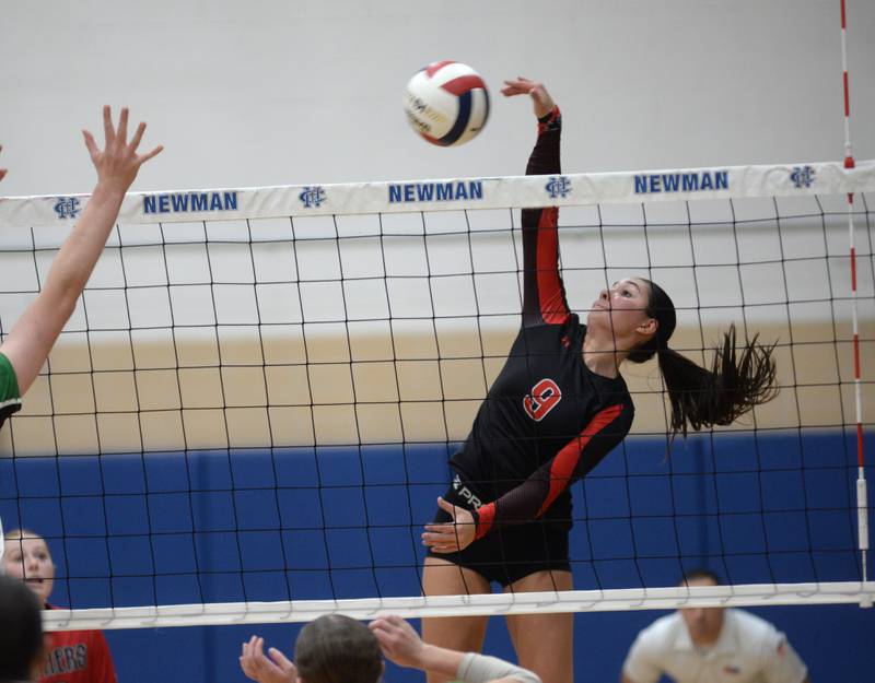 Erie-Prophetstown's Ashlyn Johnson (9) hits past Rock Falls' Kayla Hackbarth (9) during the championship of the 2A Sterling Newman Regional on Thursday, Oct. 31, 2024.