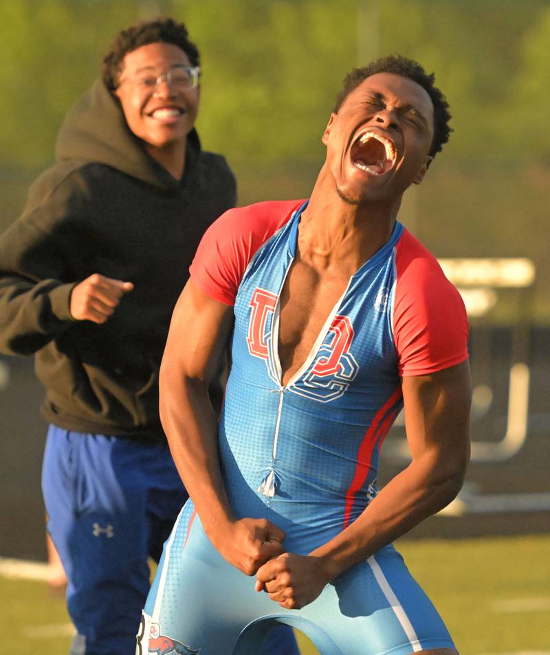 Dundee-Crown’s Terrion Spencer reacts to qualifying for the state meet in the 100-meter dash at the Class 3A Metea Valley boys sectional track and field meet in Napeville on Thursday, May 16, 2024.