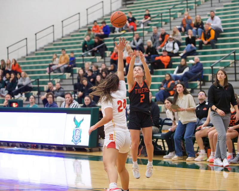 Wheaton Warrenville South's Brooke Lttersagen shoots a jumper over Batavia's Hallie Crane at the Class 4A Regional Final on Friday, Feb.26,2024 in Bartlett.