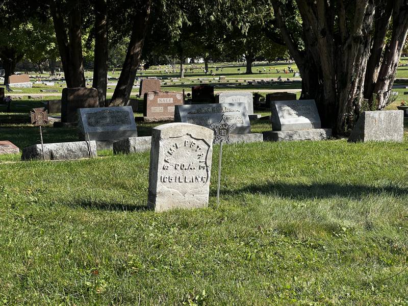 Samuel Petrie, a veteran of the Civil War and member of the Grand Army of the Republic, is buried at Elwood Cemetery. On Oct. 6, 2024 a member of the  Sons of Union Veterans of the Civil War placed a Grand Army of the Republic stake next to Petrie's tombstone.