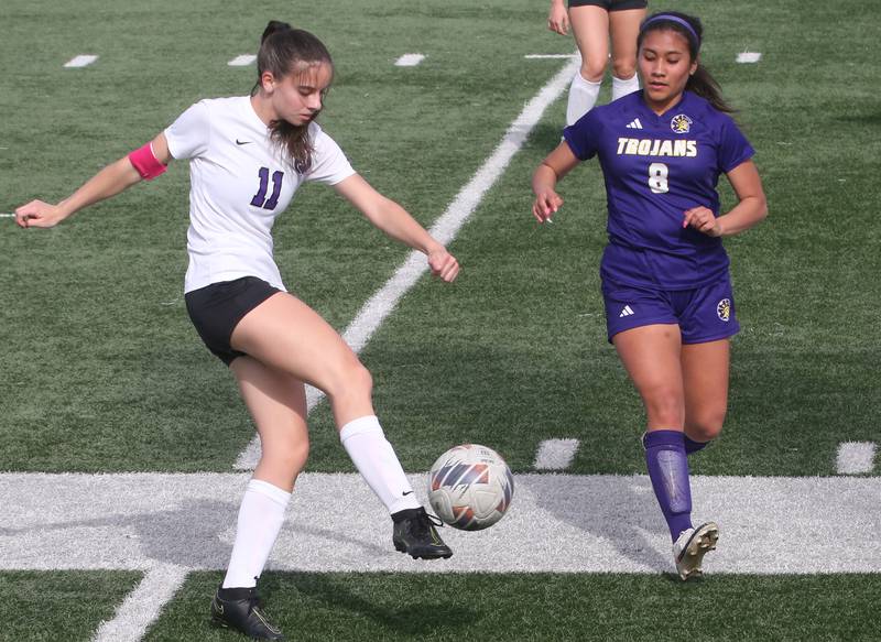 Dixon's Leah Stees kicks the ball past Mendoata's Linnea Escatel on Wednesday, May 1, 2024 at Mendota High School.