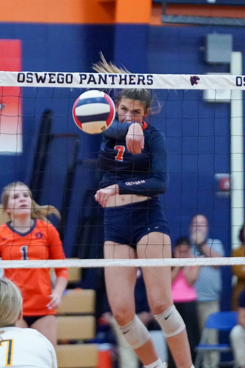 Oswego’s Hannah Herrick (7) watches a her kill attempt sail over the net during a volleyball match against Joliet West at Oswego High School on Thursday, October 24, 2024.