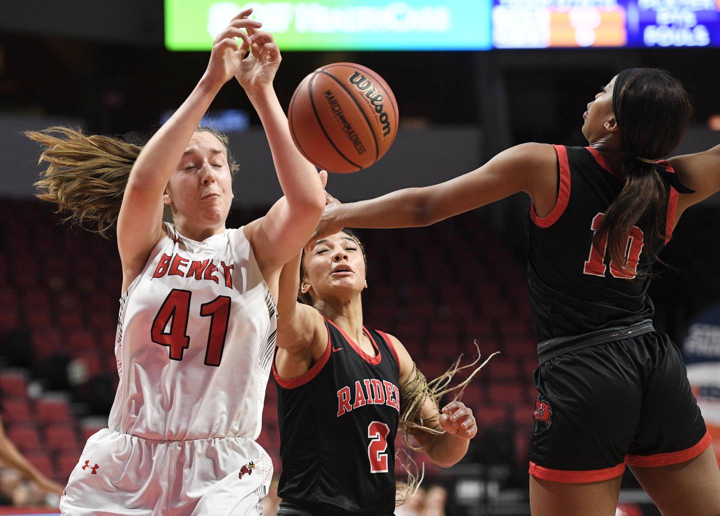 Benet Academy’s Morgan Demos and Bolingbrook's Miranda Fry and Tatiana Thomas, middle, compete for the ball in the Class 4A state 3rd place game at Redbird Arena at Illinois State University in Normal on Friday, March 4, 2022.