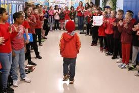  Photos: First grader Marshall Morong gets warm welcome back to school after heart transplant