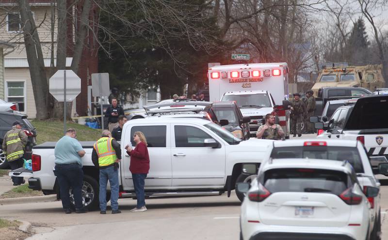 Police secure the scene of a two-story apartment building on the corner of Seventh and Charters on Sunday, March 30, 2025 in La Salle. A barricaded armed subject fired shots at officers. Police from across the Illinois Valley assisted in the incident.