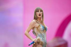Which Illinois Target stores are opening late Thursday for Taylor Swift album release?