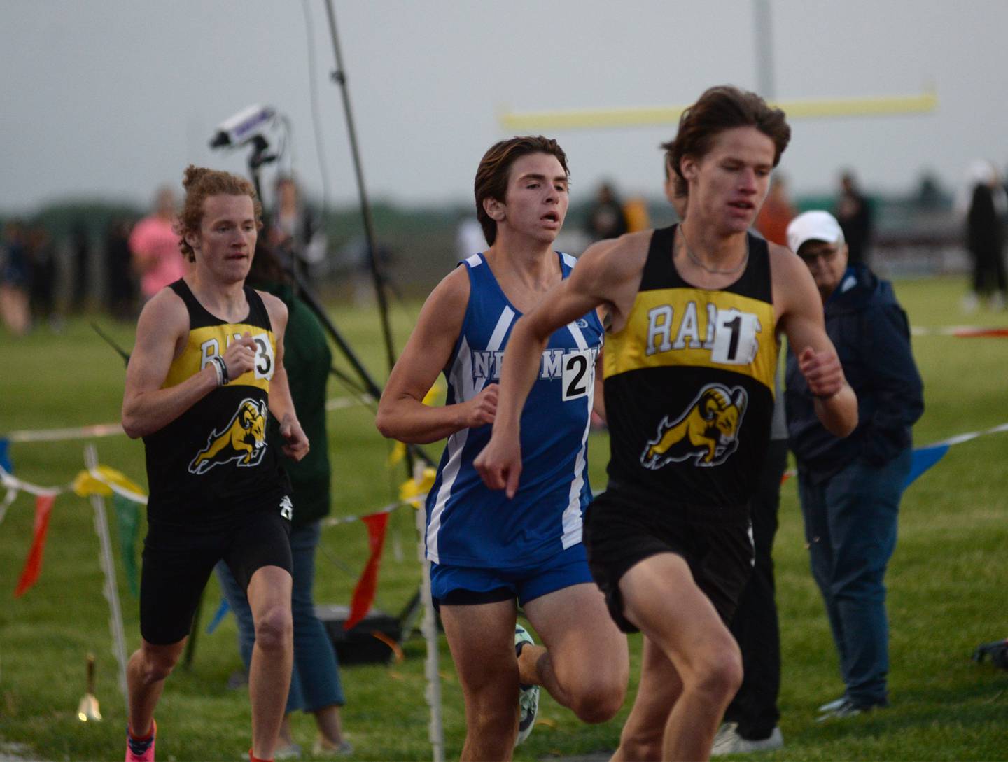 Riverdale's Tommy Murray leads Newman's Lucas Schaab in the 1600 meters at the1A Rockridge Sectional on Friday, May 19.