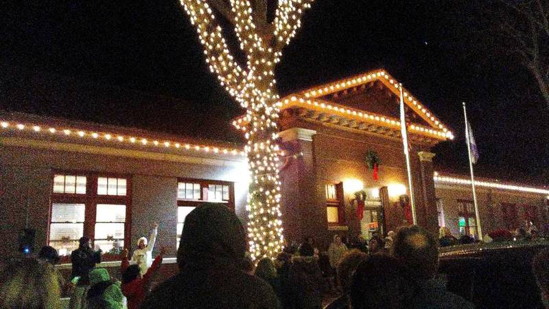 The Plano Train Depot lights up for the holiday season at the Plano Rockin' Christmas Parade on Dec. 3, 2021 (Mark Foster)